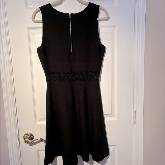 Black Knitted Dress with embroidered beads. - Picture 8 of 9
